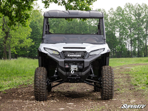 SuperATV half windshield on a Kawasaki Ridge, angle view