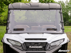 SuperATV vented full windshield on a Kawasaki Ridge, installed close-up