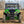 SuperATV flip down windshield on a Kawasaki Teryx, installed close-up