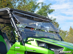 SuperATV flip windshield on a Kawasaki Teryx, installed close-up