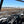 SuperATV half windshield on a Kawasaki Teryx, installed close-up