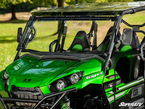 SuperATV MaxDrive power flip windshield on a Kawasaki Teryx, installed close-up