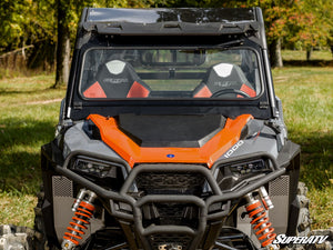SuperATV flip down glass windshield on a Polaris General, installed close-up