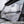 SuperATV flip down windshield on a Polaris General, installed close-up