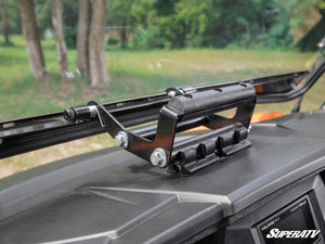 SuperATV flip windshield on a Polaris General, installed close-up