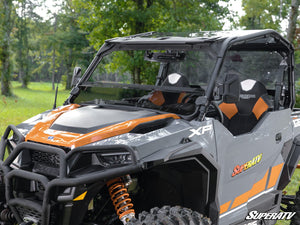 SuperATV tinted half windshield on a Polaris General, installed close-up