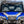 SuperATV MaxDrive Power Flip glass windshield on a Polaris General, angle view