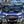 SuperATV MaxDrive Power Flip glass windshield on a Polaris General, side view