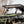 SuperATV MaxDrive Power Flip windshield on a Polaris General, side view