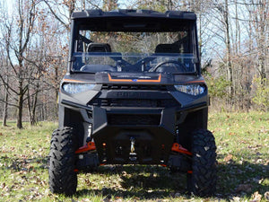 SuperATV half windshield on a Polaris Ranger, installed close-up