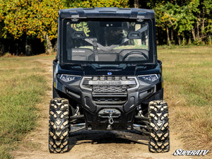 SuperATV MaxDrive power flip glass windshield on a Polaris Ranger, angle view