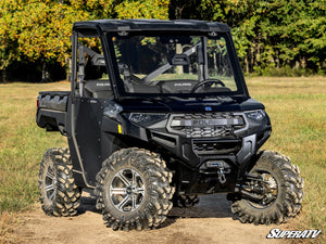 SuperATV MaxDrive power flip glass windshield on a Polaris Ranger, side view