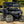 SuperATV MaxDrive power flip glass windshield on a Polaris Ranger, installed close-up