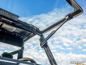 SuperATV MaxDrive power flip glass windshield on a Polaris Ranger, mounted view