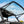 SuperATV MaxDrive power flip glass windshield on a Polaris Ranger, alternate angle