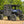 SuperATV MaxDrive power flip windshield on a Polaris Ranger, angle view
