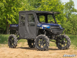SuperATV MaxDrive power flip windshield on a Polaris Ranger, angle view