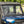 SuperATV MaxDrive power flip windshield on a Polaris Ranger, side view