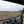 SuperATV flip windshield on a Polaris Ranger Midsize, side view