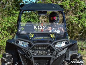 SuperATV half windshield on a Polaris RZR, feature detail graphic
