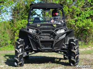 SuperATV half windshield on a Polaris RZR, installed close-up
