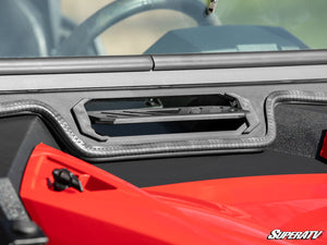 SuperATV flip down glass windshield on a Polaris RZR, detail view