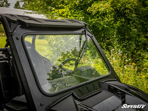 SuperATV glass windshield on a Polaris RZR, installed close-up