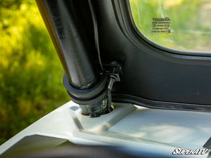 SuperATV glass windshield on a Polaris RZR, cab view