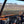 SuperATV half windshield on a Polaris RZR, installed close-up
