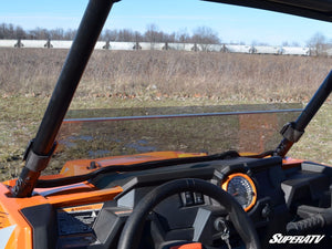 SuperATV half windshield on a Polaris RZR, installed close-up