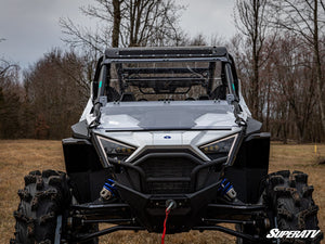 SuperATV flip down windshield on a Polaris RZR Pro XP, installed close-up
