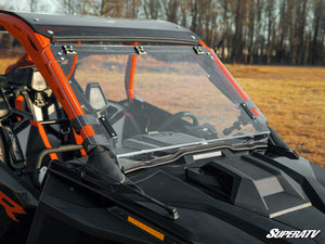 SuperATV flip windshield on a Polaris RZR Pro R, angle view