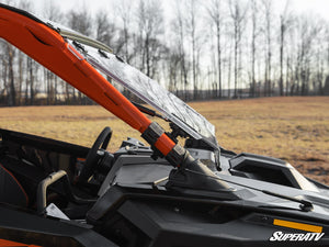 SuperATV flip windshield on a Polaris RZR Pro R, installed close-up