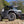 SuperATV MaxDrive power flip windshield on a Polaris RZR Pro XP, angle view