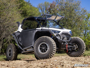 SuperATV MaxDrive power flip windshield on a Polaris RZR Pro XP, angle view
