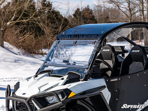 SuperATV flip windshield on a Polaris RZR Trail, installed close-up