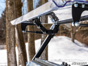 SuperATV flip windshield on a Polaris RZR Trail, detail view