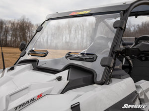 SuperATV vented full windshield on a Polaris RZR Trail, installed close-up