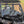 SuperATV MaxDrive power flip windshield on a Polaris RZR XP 1000, side view