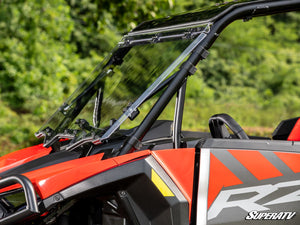 SuperATV flip windshield on a 2024+ Polaris RZR XP, cab view