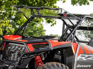 SuperATV flip windshield on a 2024+ Polaris RZR XP, detail view