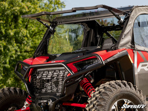 SuperATV MaxDrive power flip windshield on a 2024+ Polaris RZR XP, front view