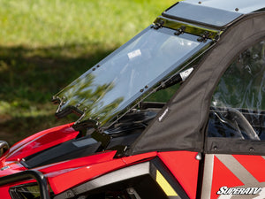 SuperATV MaxDrive power flip windshield on a 2024+ Polaris RZR XP, side view
