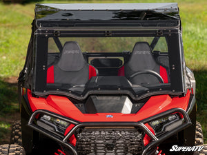 SuperATV MaxDrive power flip windshield on a 2024+ Polaris RZR XP, installed close-up