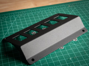 StayFlush Motorsports SFM Polaris 200 EFI rocker switch mount for clean dash fit, showing the device mount on a vehicle dashboard.