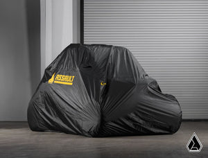 Assault Industries universal UTV cover fitted over a parked side-by-side