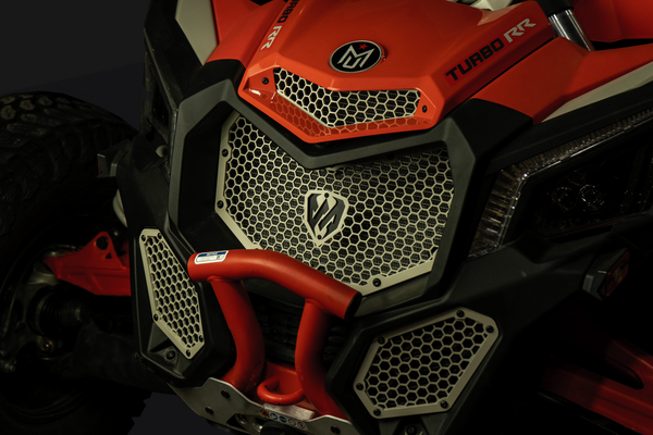 Moto Armor radiator grill set for 2017–2024 Can-Am Maverick X3 models, crafted from thick aluminum with honeycomb design for airflow and protection.