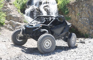 ZBROZ Stage 1 Spring Kit installed on 2024 Can-Am Maverick R with Smart Shox, showing ride height recovery and coil spring upgrade.
