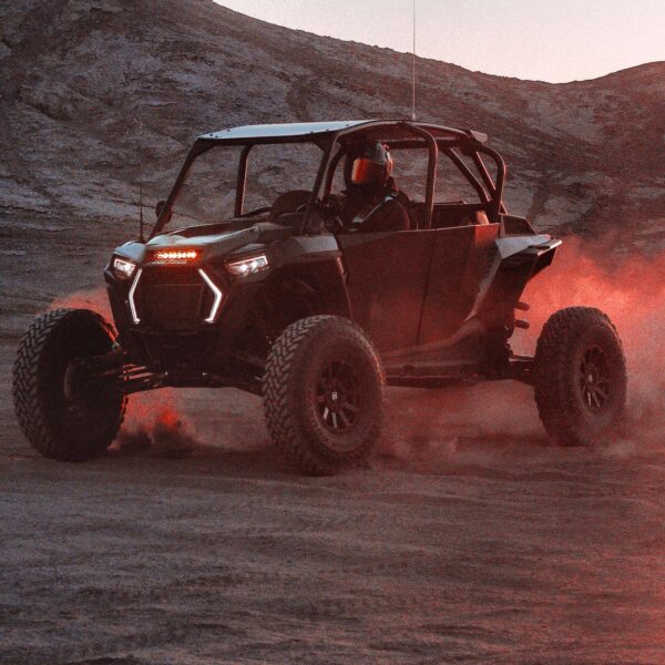 mounted on RZR in desert